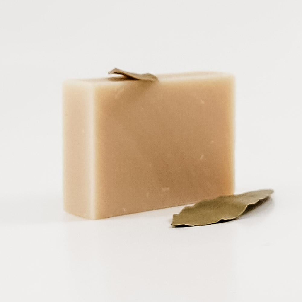 https://www.susansoaps.com/wp-content/uploads/2019/05/bay-rum-shampoo-bar-unwrapped.jpg