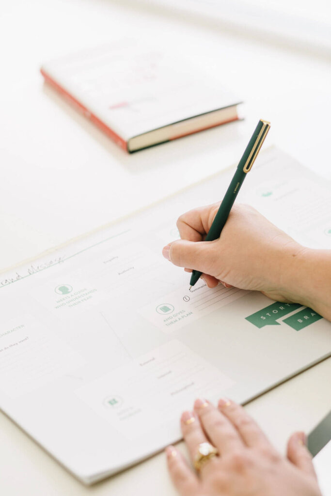 social self care planning A woman writes in a planner. Make a Plan to bring social self care into your life